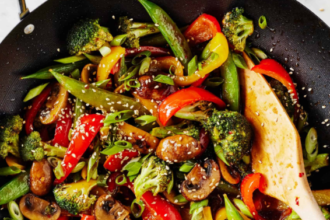 Vegetable stir fry with colorful fresh vegetables and homemade sauce